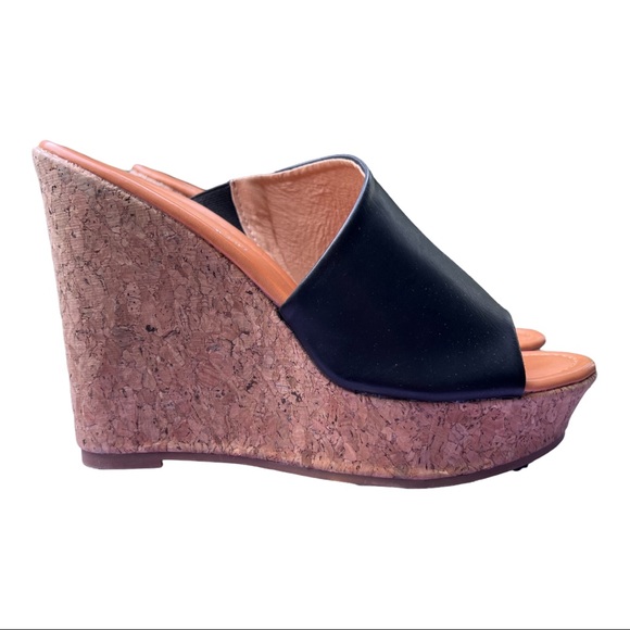 Madden Girl
Nuriel Cork Wedges  
Black
4-1/2" Cork Wedge Heel - Picture 5 of 16